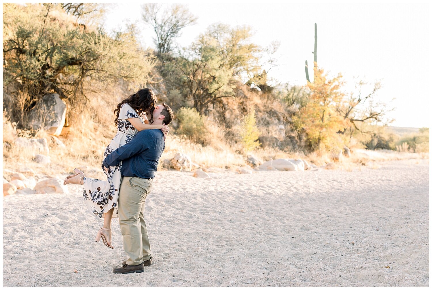 Tucson Engagement Photographer Melissa Fritzsche Photography captures in love couple sharing a romantic moment during their engagement session at Catalina State Park.