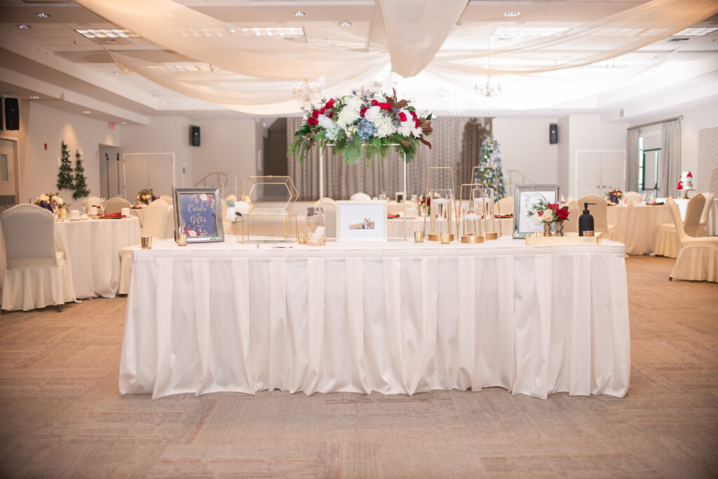 Ballroom with crystal chandeliers and softly drapped fabric.