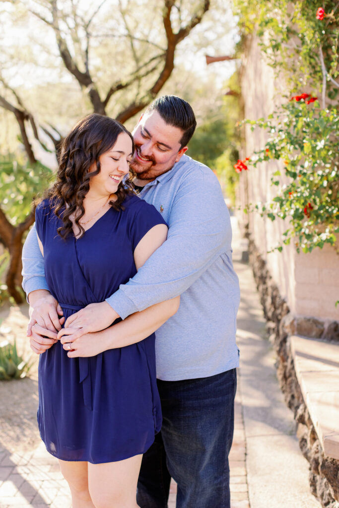 Mercado San Augustin Tucson engagement pictures provide a downtown vibe with colorful buildings as the backdrop. 