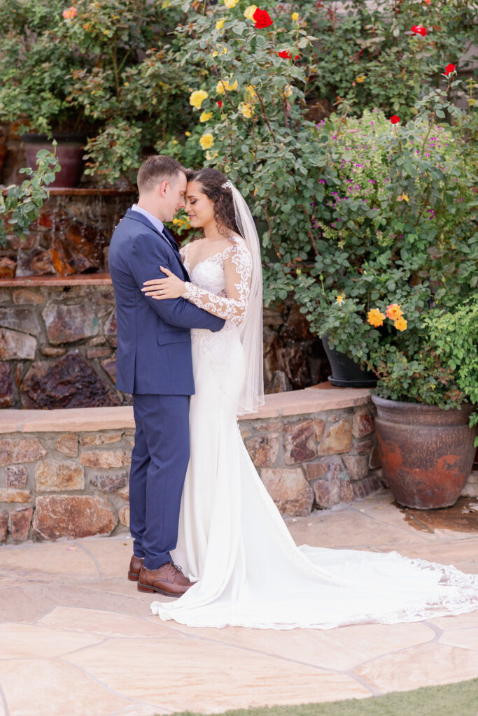 Saguaro Buttes has a beautiful rose garden courtyard, stunning mountain and desert views along with a pond perfect for your outdoor wedding.
